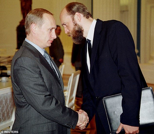 Pugachev was nicknamed 'Putin's banker' due to his close ties to the Russian president in the early 2000s (Putin and Pugachev pictured in 2000)
