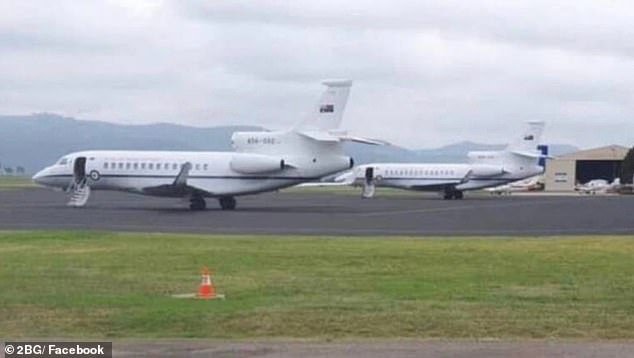 An eagle-eyed local on Thursday revealed two Royal Australian Air Force planes waiting on the tarmac at Scone Airport, sparking the saga (pictured)