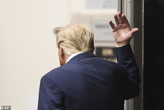 Republican presidential candidate and former President Donald Trump gestures as he walks through Manhattan Criminal Courthouse in New York, Tuesday, April 23, 2024