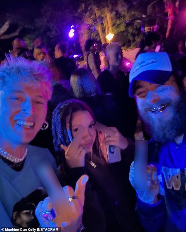 MGK also shared a photo with his daughter Casie, 14, and celebrity boyfriend Post Malone, 28, who were seen flipping the bird for the camera