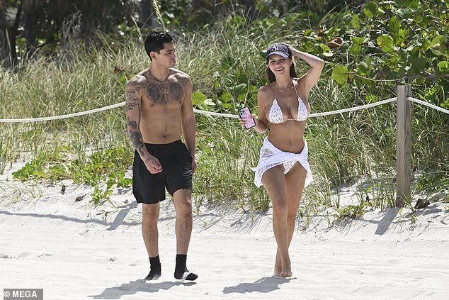 Garcia was dressed in shorts and socks, while Boor wore a revealing white bikini