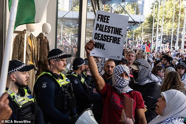 The University of Melbourne will protest on Anzac Day to ask the university to stop accepting 'blood money' (pictured are pro-Palestinian protesters who gathered on Sunday)