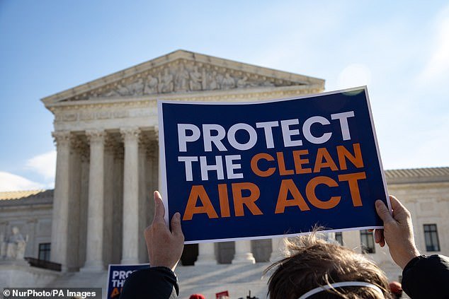 The Clean Air Act allows the EPA to place limits on the amount of emissions that can be produced in the US.  Pictured: Climate activists protest outside the Supreme Court in Washington, DC, in 2022