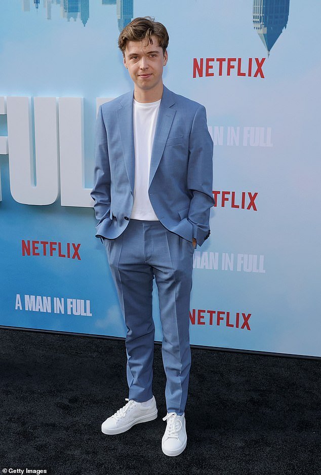 Evan Roe, who plays Wally Croker, opted for a powder blue suit with white sneakers