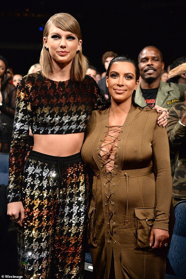 Taylor and Kim pictured in a friendly embrace at the 2015 MTV VMAs