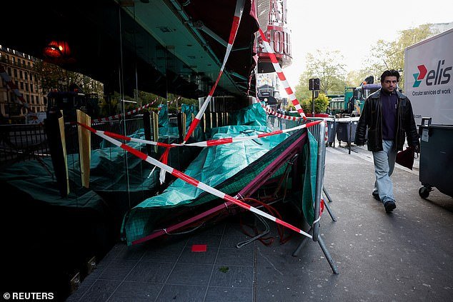 Cordons and barricades were seen around the unit, which was covered by a tarpaulin before it was removed this morning