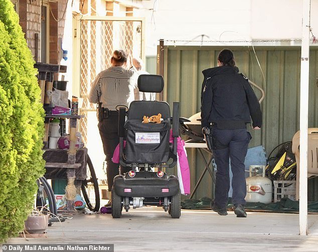 Mrs Bates used a mobility scooter to get around due to health complications related to her type 1 diabetes (photo: police search the property)