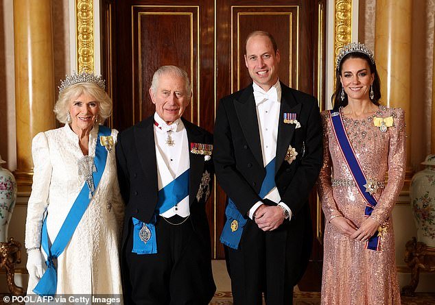 Camilla, Charles, William and Kate smile in their finery at the reception for members of the Diplomatic Corps at Buckingham Palace in 2023