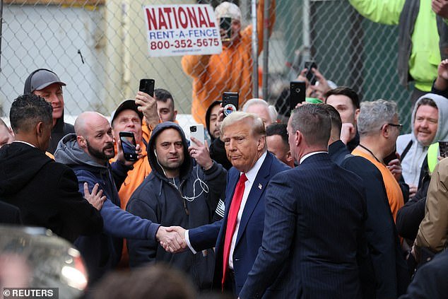Republican presidential candidate and former US President Donald Trump meets with union workers in New York City on April 25