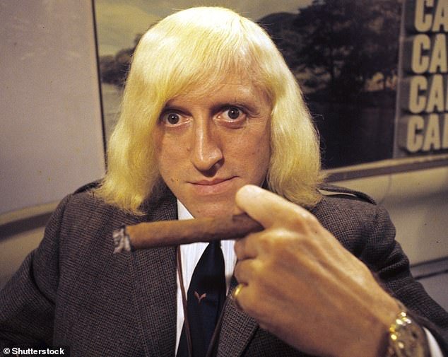 Despicable critics compared John to Jimmy Savile, who was hailed as a philanthropic TV star before being exposed as one of Britain's most prolific pedophiles - who allegedly abused children from the mid-1940s until 2009, two years before his death (Savile pictured in 1970)