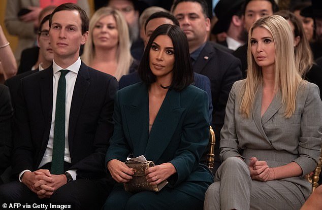 Reality TV star Kim Kardashian (center) sits between Jared Kushner (left) and Ivanka Trump (right) during a White House event on criminal justice reform in June 2019