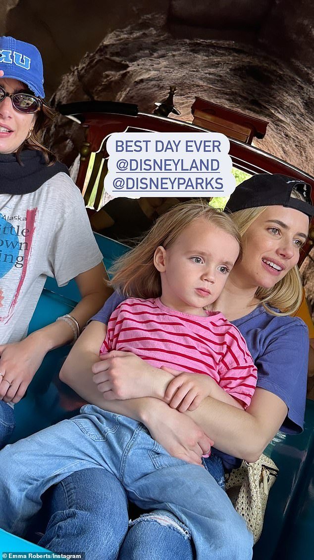 Emma was also accompanied at the popular theme park by her younger half-sister Grace Nickels (L)