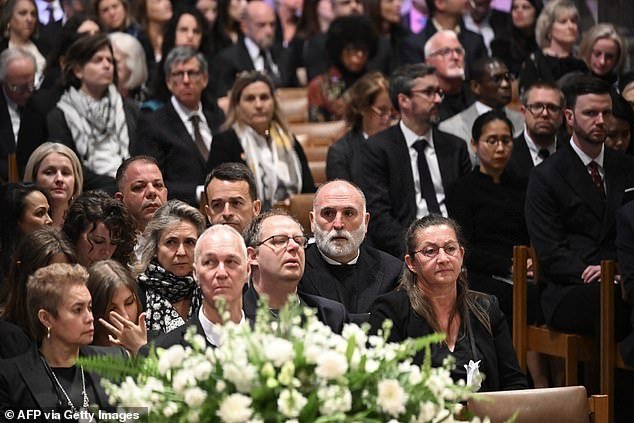 Chef Jose Andres sits among the crowd ahead of Thursday's service for the seven aid workers from World Central Kitchen in Gaza on April 1.  Most of the 560 audience members worked for the hunger organization Andres founded.