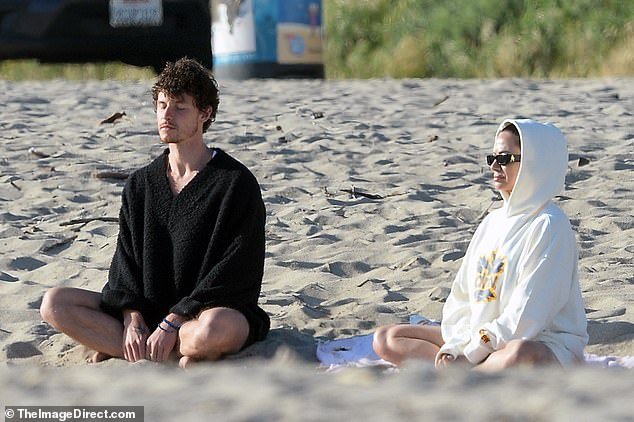 For their outing, the Stitches hitmaker presented a casual look, wearing a black knit sweater over a white tank top.  He wore black shorts and brown suede clogs for his comfortable, casual beach look