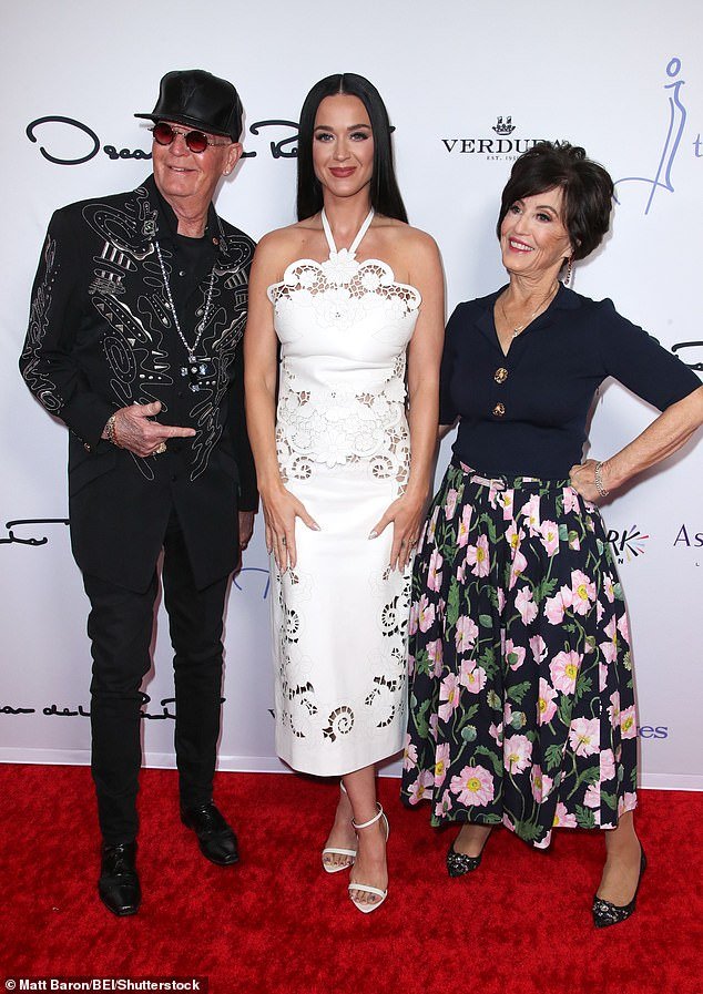 As she arrived on the red carpet, she was joined by her parents, who are both Pentecostal pastors, for a sweet photo.