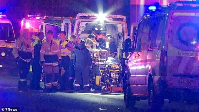 Emergency services had to free the woman, 38, and five-year-old boy from the wreckage after the collision at St Marys in Sydney's west just after 3am on Friday.