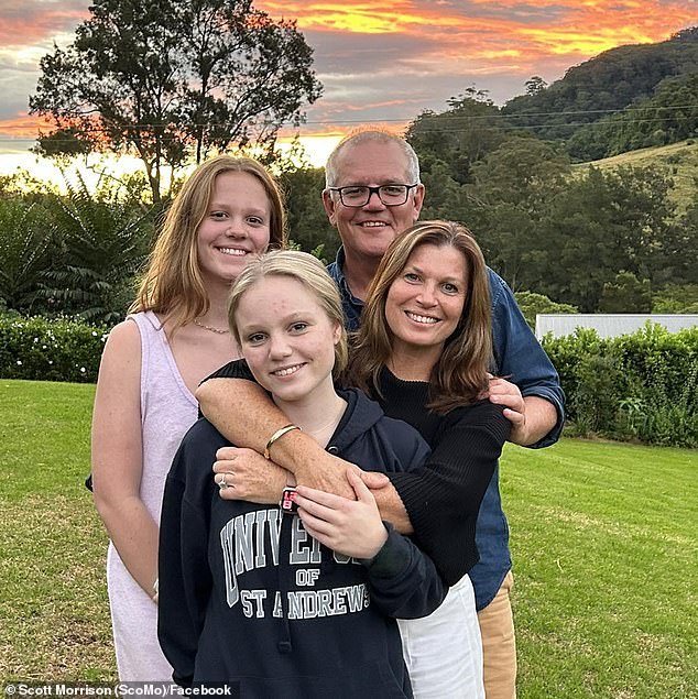 Mr Morrison is seen with his wife Jenny and daughters Lily and Abbey