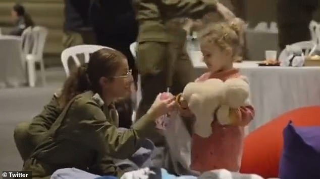 Abigail is briefly seen with an IDF soldier after her release by Hamas in November