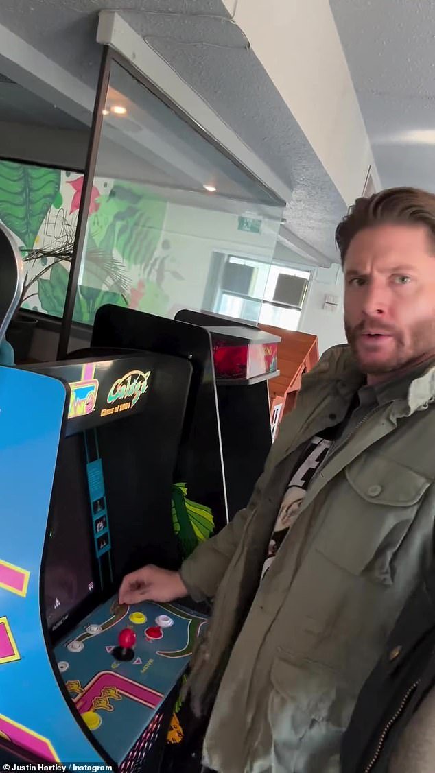 Meanwhile, Jensen was playing an arcade game in the background