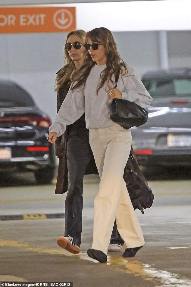 Miley and her mother Tish kept their cool as they headed to a meeting together in style