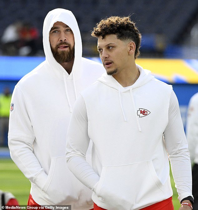 Travis Kelce, left, with quarterback Patrick Mahomes - two of Worthy's new teammates