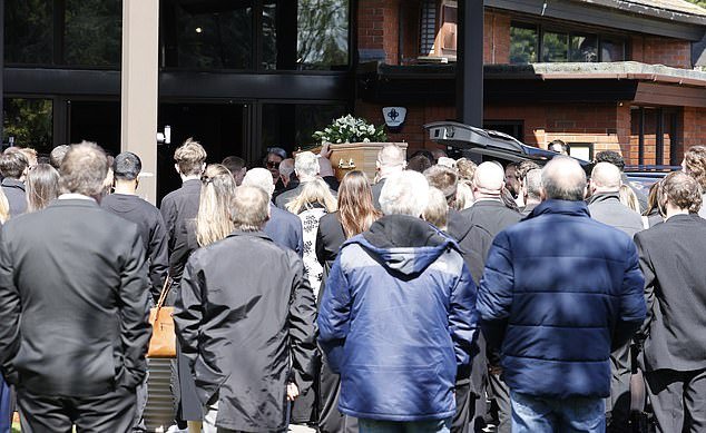 Crowds of people attended the service today where George's coffin was carried