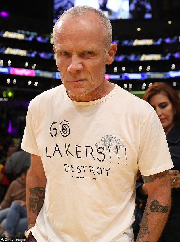Flea wore a white T-shirt with the words 'Go Lakers!!!  Destroy', but unfortunately Denver proved too much for them for the third time in a row