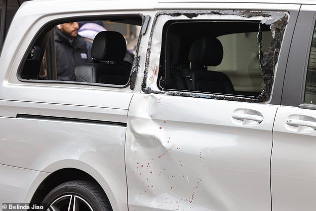 Quaker crashed into a silver Mercedes taxi, shattering the windows and leaving deep dents with blood splattered down the side