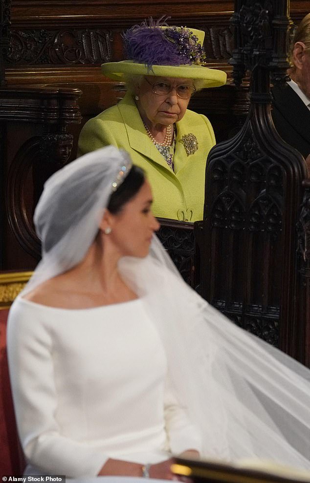 It is said that Queen Elizabeth thought Meghan Markle's wedding dress was 'too white' for a divorcee