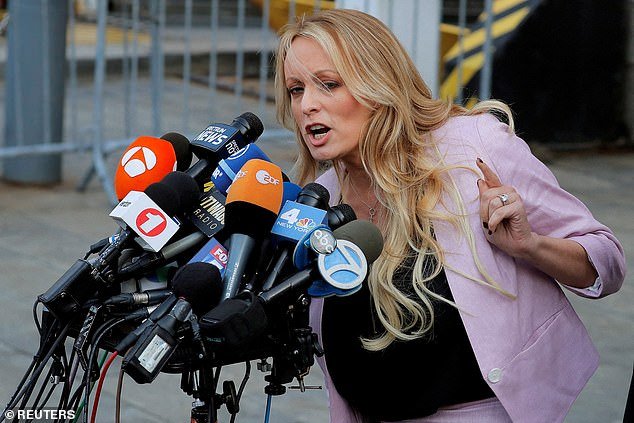 Adult film actress Stephanie Clifford, also known as Stormy Daniels, speaks as she leaves the federal courthouse in the Manhattan borough of New York City, New York, USA, April 16, 2018
