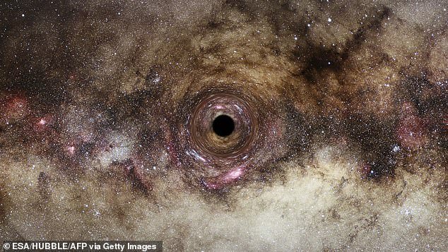 Hubble took this photo of a black hole in our galaxy, the Milky Way.  Black holes distort light nearby, creating this effect called 