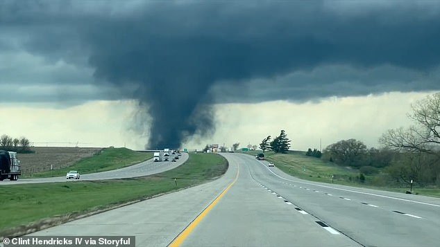 The storm could be seen crossing a six-lane highway as the tornado made its path