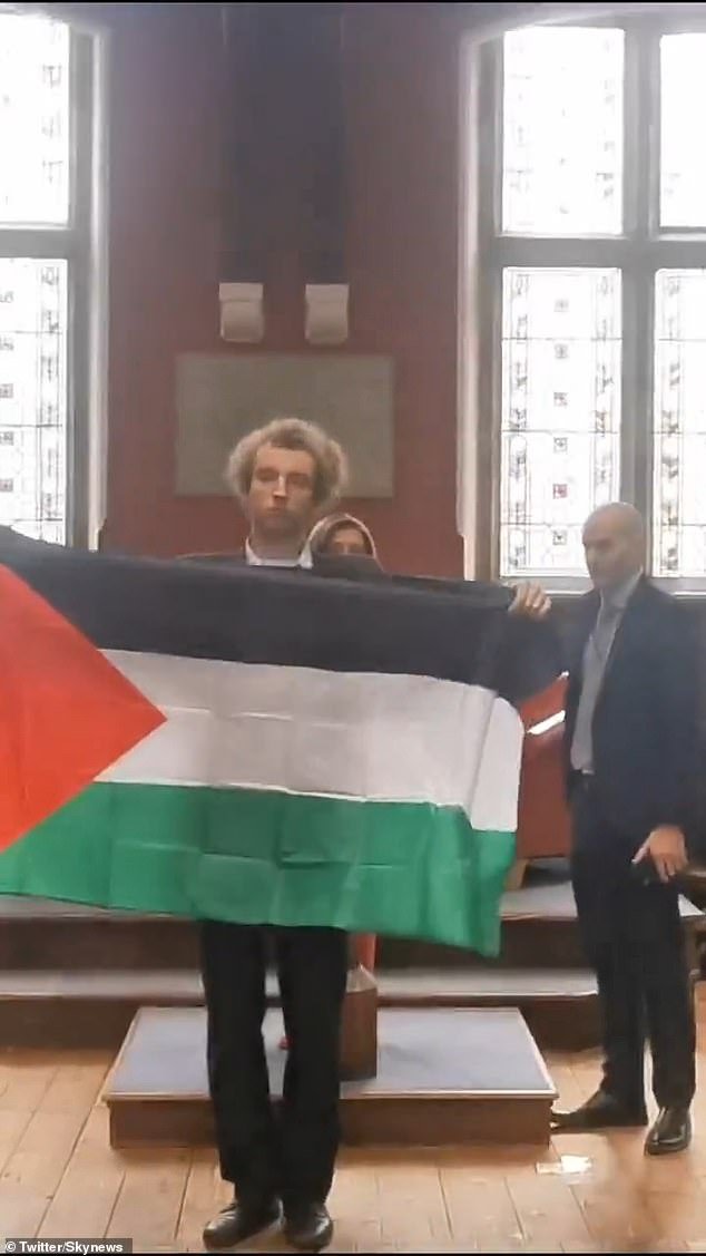 The California Democrat delivered a speech to the debating society in Oxford as protesters walked right in front of her stage, silently holding up Palestinian flags until they were escorted out by security.