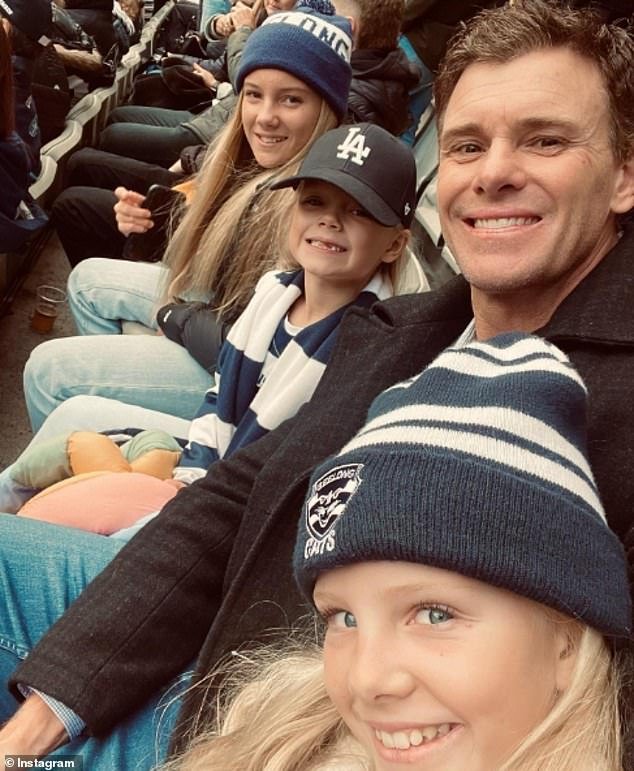 Mooney and his daughters Jackie, Billi and Stevie enjoy an afternoon of football in the Cattery