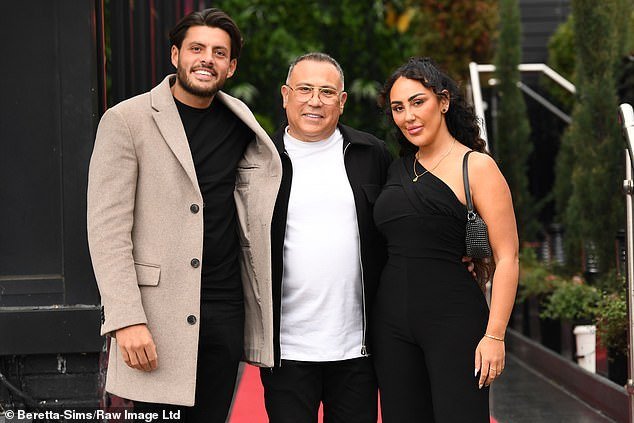 The sweet couple were then joined by Sophie's dad Kevin, who looked amazing in a white T-shirt and black bomber jacket