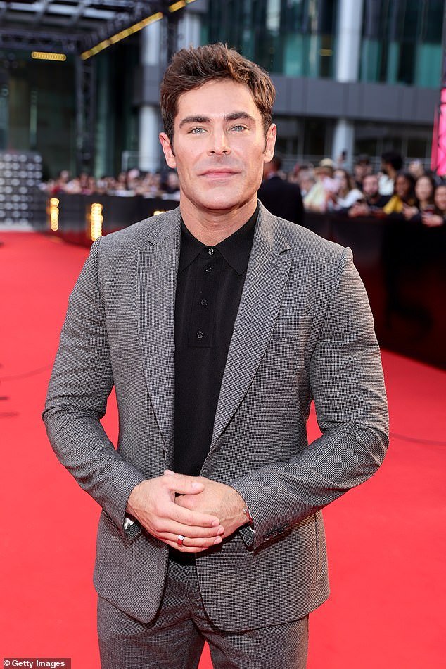 High School Musical star Zac Efron (just 36 years old) blamed a collision with a granite fountain at his home for the new face that emerged in 2022.  (Image: Efron in 2022).