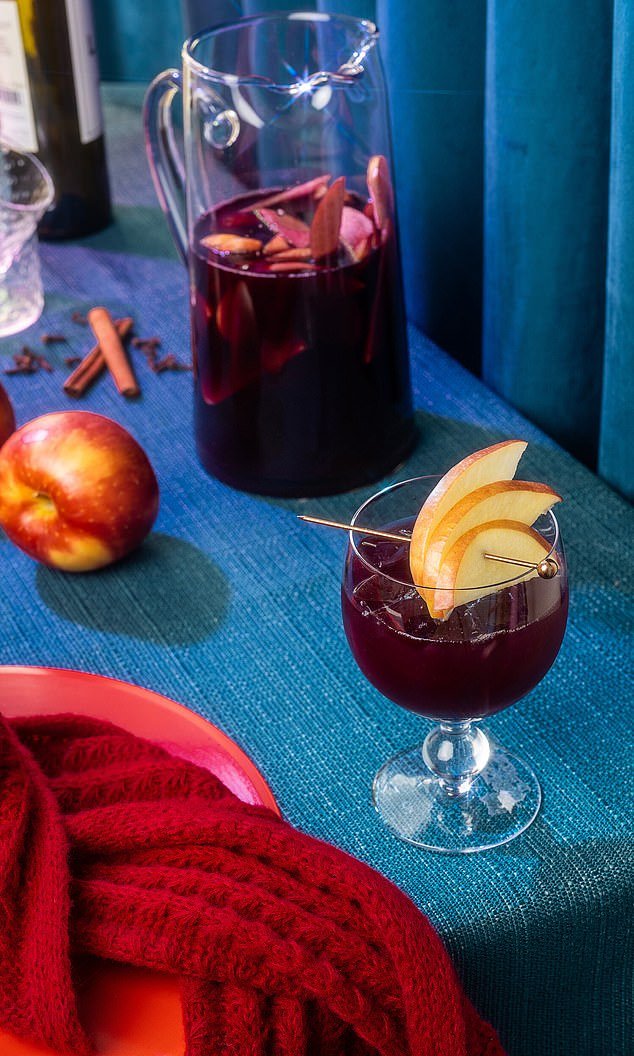 Each chapter in the book covers cocktails you can drink at different stages of a love relationship: heartbreak, anger, healing, celebration, comfort, longing and love (photo: Sad Girl Sangria inspired by Swift's 10-minute break-up ballad 'All Too Well')