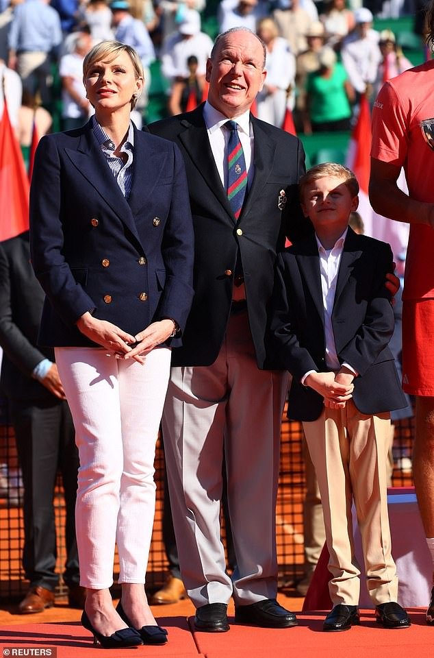 Princess Charlene of Monaco and Prince Albert are pictured with their son Jacques at the trophy presentation on April 14