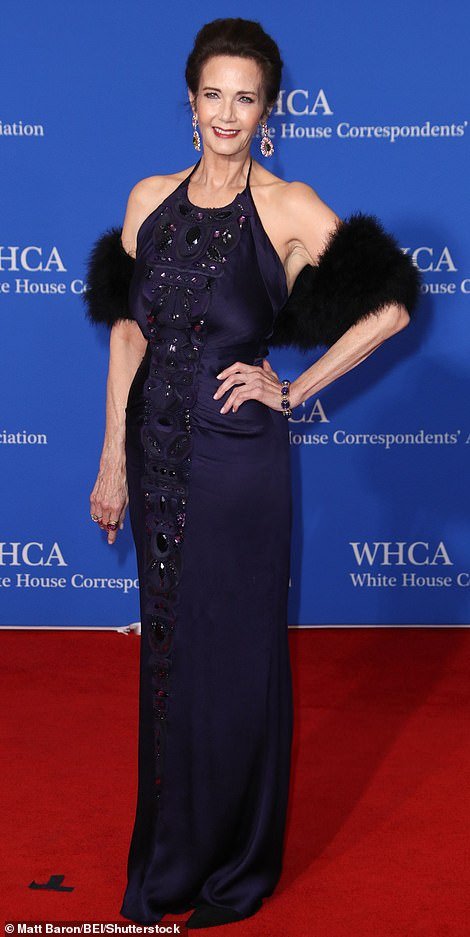 Wonder Woman actress Lynda Carter stunned in a dark blue dress that hugged her body and featured dazzling details in the front
