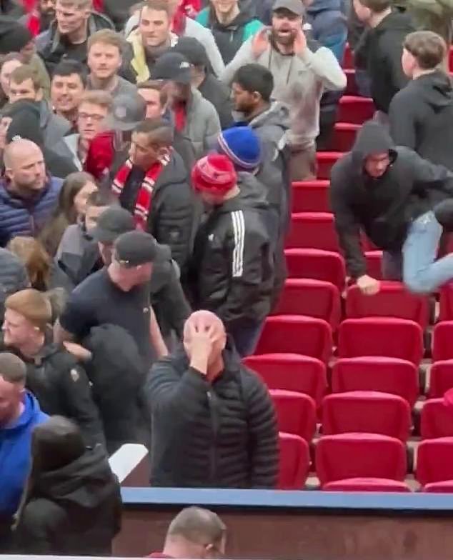 A Manchester United fan made sick gestures during the FA Cup win over Liverpool