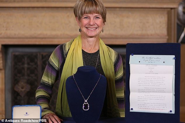 The guest (photo) poses with the amethyst necklace that is said to have once belonged to socialite Lillie Langtry