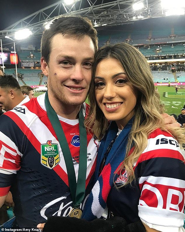 The 32-year-old (pictured with wife Amy) was left in doubt about his future as a player when he suffered a shocking series of concussions in 2018-19.