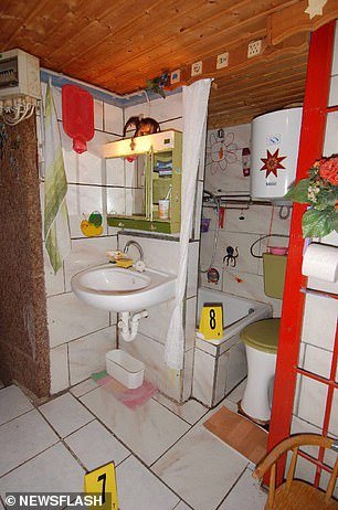 Evidence at the crime scene shows the bathroom the family had to share