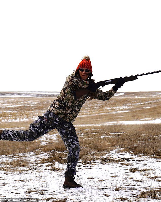 A Facebook photo shows South Dakota Governor Kristi Noem with a gun.  In her upcoming book, she writes about Cricket, a 14-month-old wirehaired pointer, who shot Noem in the gravel pit on her family property just before her children came home from school.