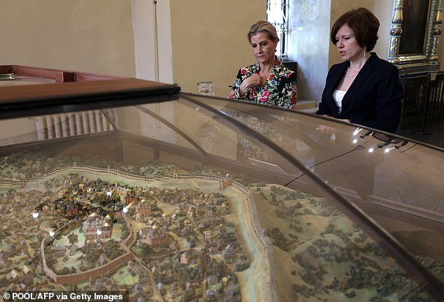 The Duchess views a historic model of Kiev at St. Sophia's Cathedral in Kiev during her visit on Monday