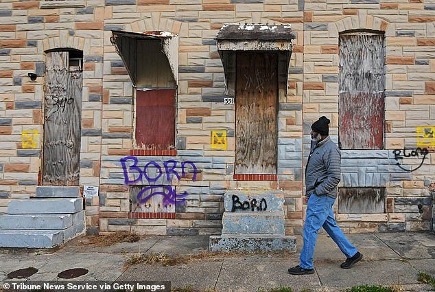 The city of Baltimore is selling vacant homes for a dollar each to revitalize distressed neighborhoods