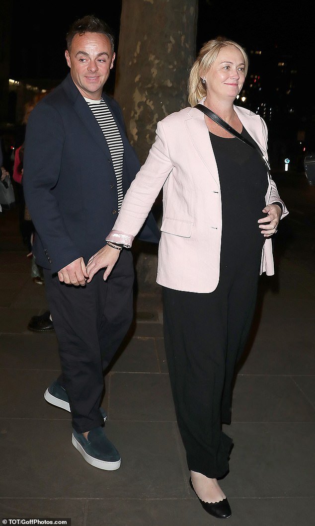 Ant McPartlin and his pregnant wife Anne-Marie Corbett held hands as they left the Kit Kat Club at London's Playhouse Theater on Wednesday evening, where they had been watching Cabaret.
