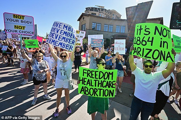 Abortion rights protesters in Scottsdale, Arizona on April 9 after the state Supreme Court ruled that an 1864 law banning abortion in almost all cases could be enforced