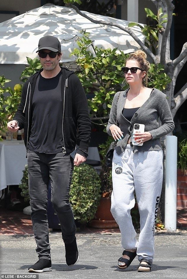 Ashley Benson, 34, and her fiancé Brandon Davis, 43, got a brief reprieve from their parental duties and grabbed lunch together in West Hollywood on Friday afternoon.