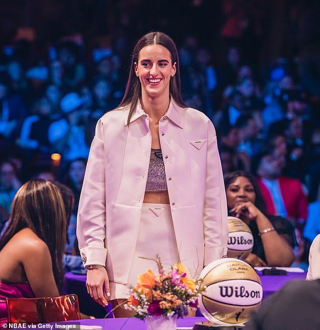 Caitlin Clark, seen during Monday's WNBA Draft, signed a four-year deal worth $338,056